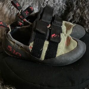 Women's Climbing Shoes - Black and Green and mammut harness.